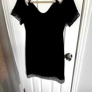 WHBM off shoulder black dress, lace trim on bottom of sleeves and hemline